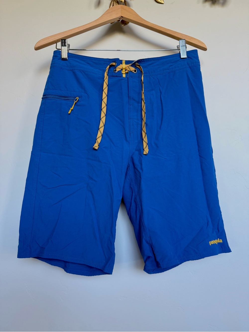 Patagonia Blue Board Shorts with Yellow Drawcord